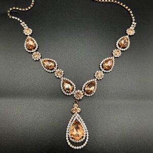 Vintage necklace with champagne-colored teardrop stones.